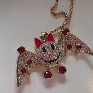 Betsey Johnson Gold and Pink Smiling Bat Necklace